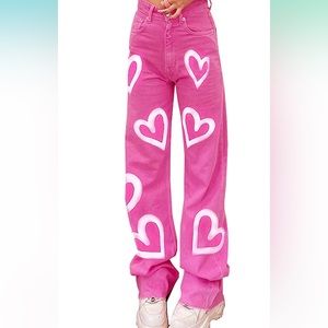 Pink denim jeans with white hearts